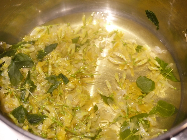 honeysuckle blossoms tea, a slightly yellow liquid